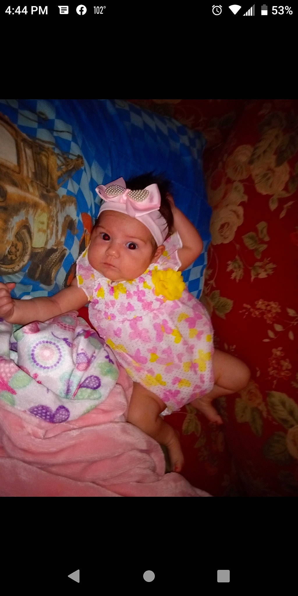 Danyella is registered to the contest to win money with this photo: abdomen, baby, baby_toddler_clothing, cheek, comfort, flash_photography, fun, happy, hat, headgear, headwear, iris, lap, magenta, mouth, person, pink, purple, skin, textile