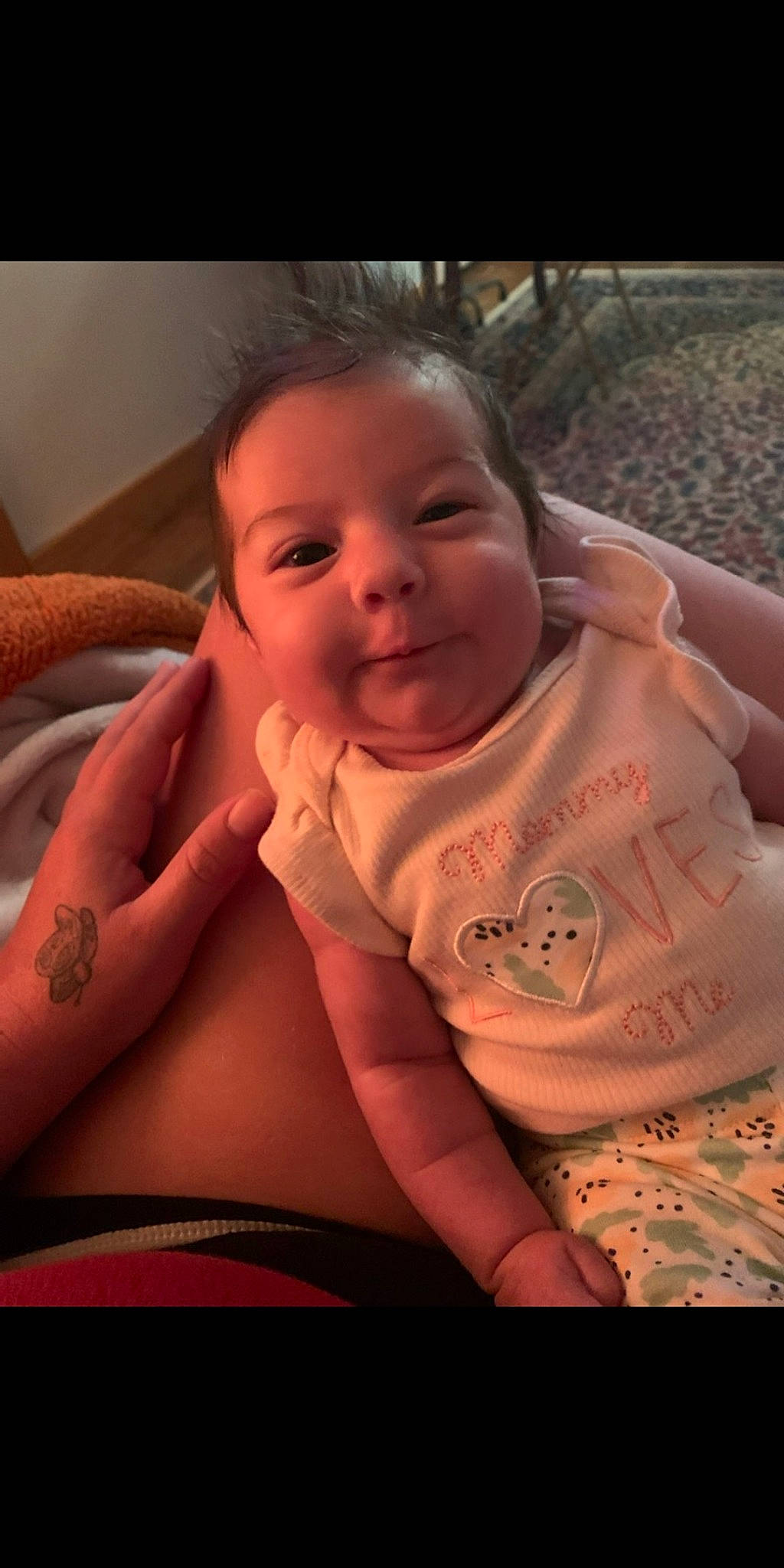 Danyella is registered to the contest to win money with this photo: arm, baby, cheek, child, chin, comfort, finger, flash_photography, gesture, hand, happy, iris, lip, mouth, neck, nose, person, skin, sleeve, smile