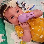 Hannah joined the competition — help win amazing prizes! accessories, baby, bodypart, clothing, cream, cutlery, dessert, face, finger, food, furniture, glove, hand, head, icecream, person, photography, portrait, spoon, tape