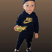 Alessio a rejoint le concours — aidez-le/la à gagner de superbes lots ! backwards_cap, black_clothing, boy, cap, casual, child, cute, fashion, golden_toy, hoodie, isolated, nike, portrait, smiling, sneakers, standing, studio_background, toddler, toy, young_child