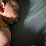 arm, baby, bed, calm, child, closeup, face, indoor, infant, napping, pacifier, peaceful, portrait, quiet, rest, shadow, skin, sleeping, soft_light, young
