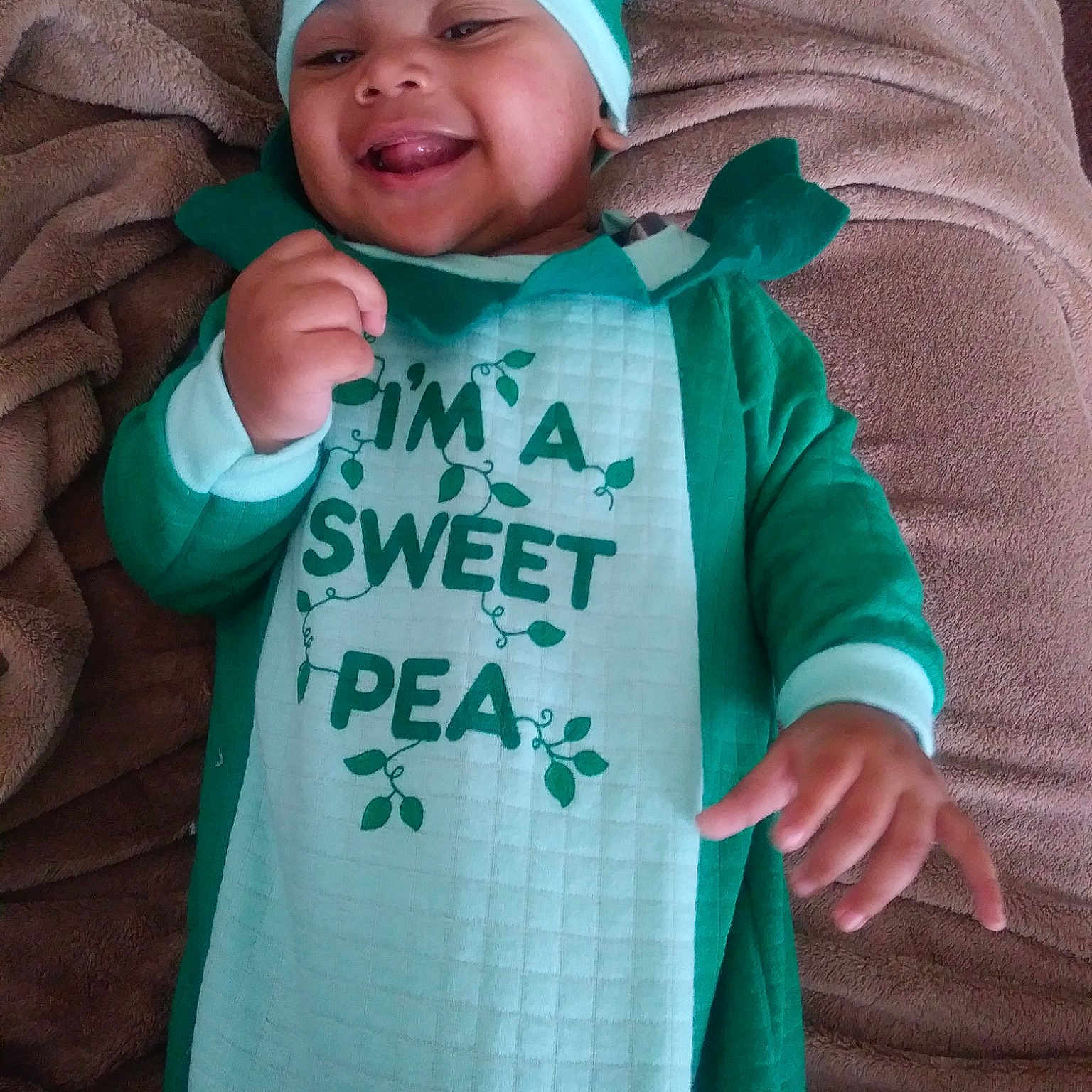 Solomon joined the competition — help win amazing prizes! child, clothing, cool, costume, day, facial_expression, fun, green, happiness, headgear, human, infant, joy, outerwear, person, product, purple, smile, standing, t_shirt