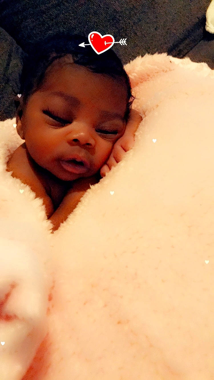 Dríyms is registered to the contest to win money with this photo: baby, beauty, black_hair, cheek, chest, child, ear, eye, eyebrow, face, flesh, forehead, head, lip, mouth, nose, person, skin, smile, toddler