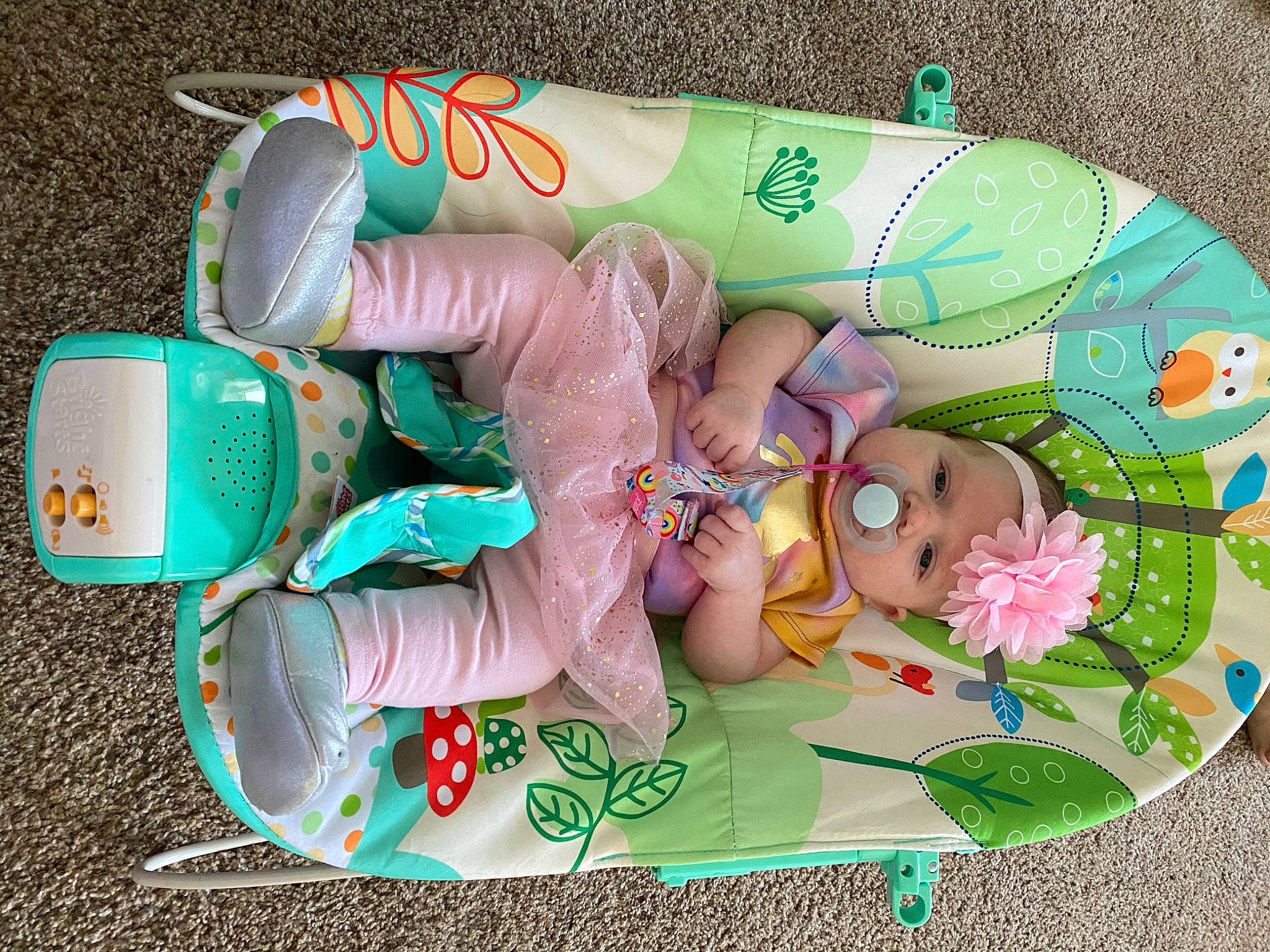 Freya is registered to the contest to win money with this photo: baby_products, creative_arts, event, fashion_accessory, font, foot, green, headwear, nail, pattern, person, pink, sweetness, wrist