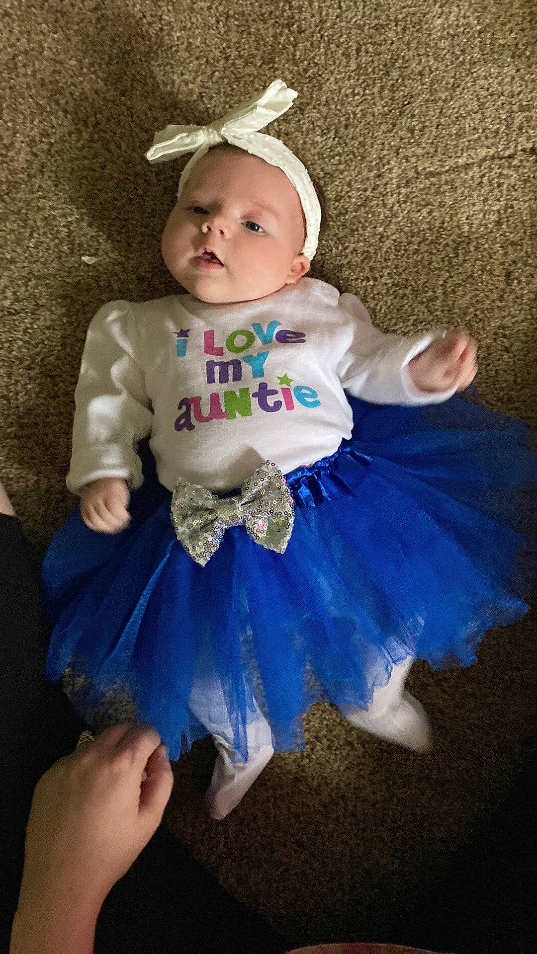 Freya is registered to the contest to win money with this photo: baby, baby_products, baby_toddler_clothing, ballet_tutu, child, costume_hat, day_dress, dress, electric_blue, embellishment, face, fashion_accessory, hair_accessory, happy, headgear, headpiece, person, pink, ruffle, sleeve