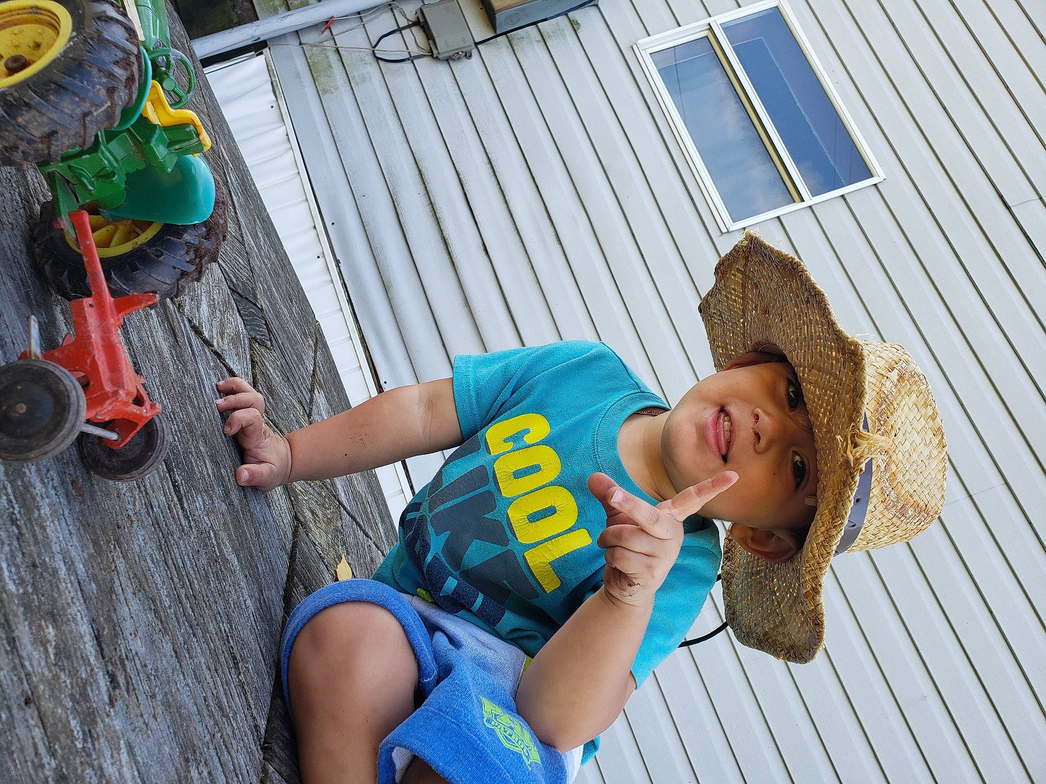 Fabian is registered to the contest to win money with this photo: child, headwear, leisure, person, summer, toddler, vacation, water