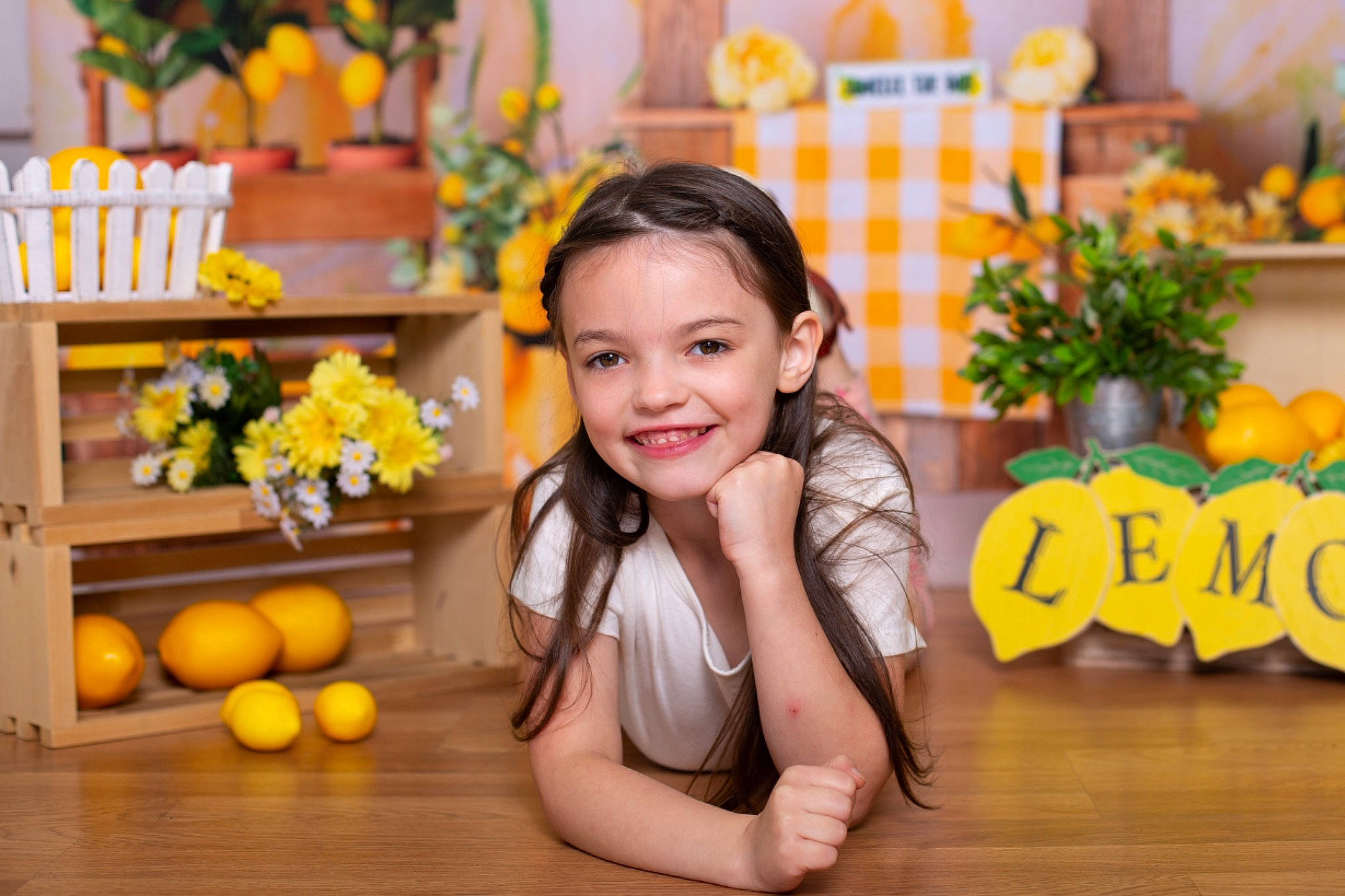Jayda is registered to the contest to win money with this photo: child, dress, event, flooring, flower_arranging, fun, grass, happy, hardwood, joy, leisure, orange, person, plant, smile, snapshot, summer, t_shirt, tableware, toddler