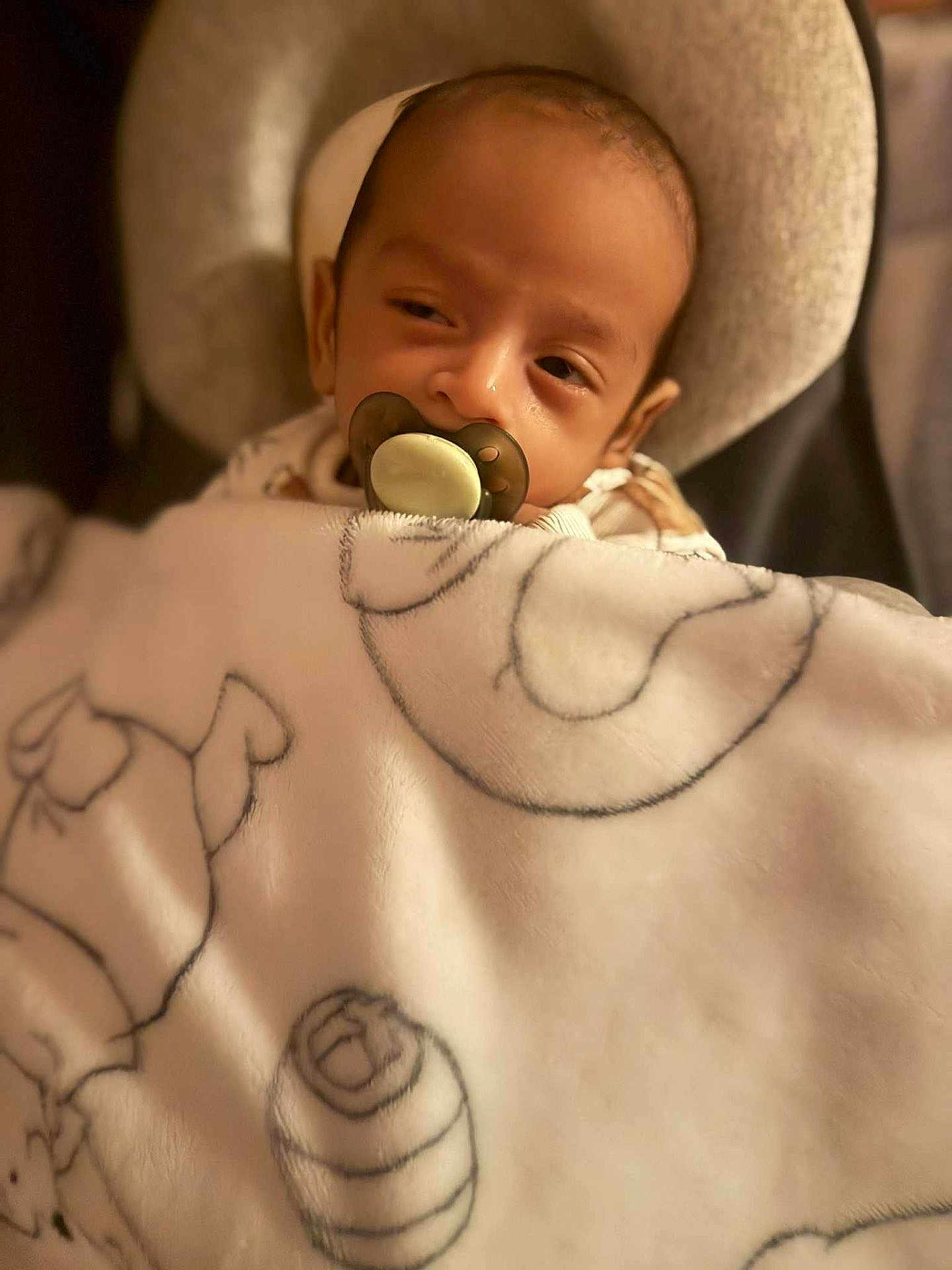 Jan joined the competition — help win amazing prizes! baby, pacifier, blanket, soft, sleepy, infant, cozy, face, headrest, cushion, closeup, indoor, child, wrapped, comfort, nap, young, person, babywear, peaceful