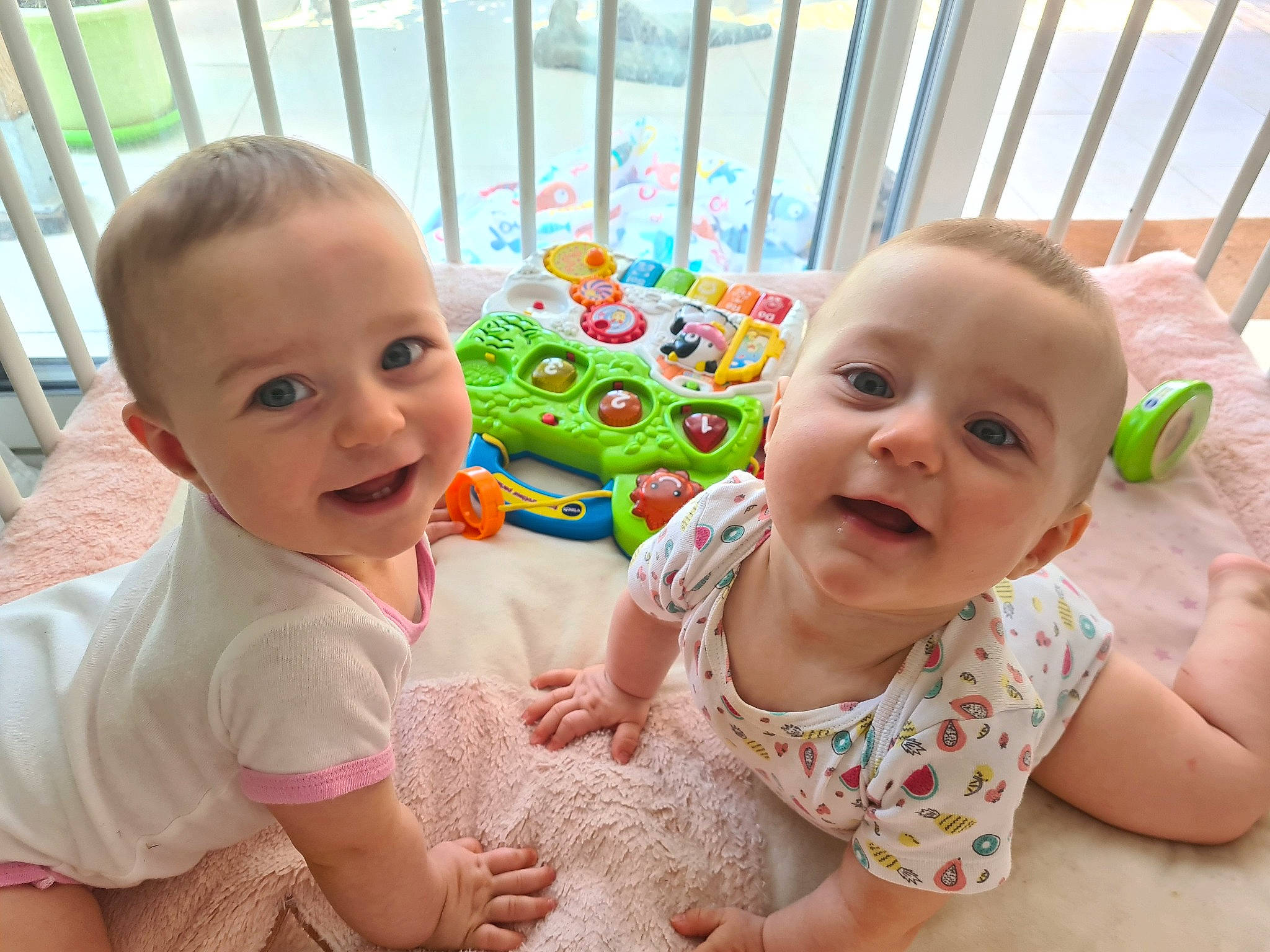 Harmony participe au concours pour gagner de l'argent avec cette photo : baby, baby_toddler_clothing, cheek, child, chin, dress, eye, flooring, happy, head, iris, joy, leisure, nose, people, person, pink, skin, sleeve, smile