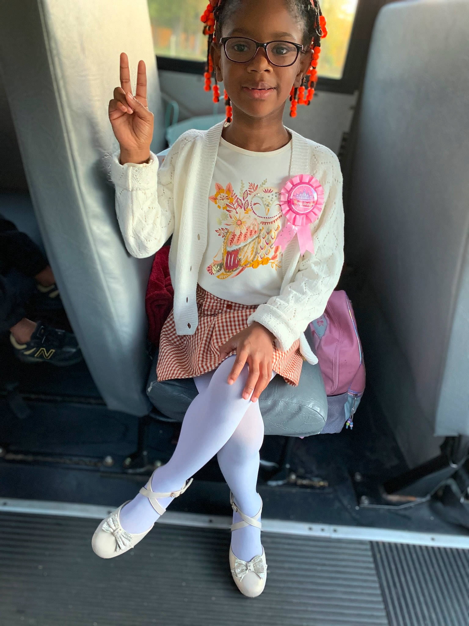 Nevaeh joined the competition — help win amazing prizes! cool, denim, eyewear, fashion_accessory, fashion_design, fun, human_leg, jewellery, joint, joy, knee, necklace, pattern, person, sitting, sleeve, sportswear, t_shirt, thigh, vacation