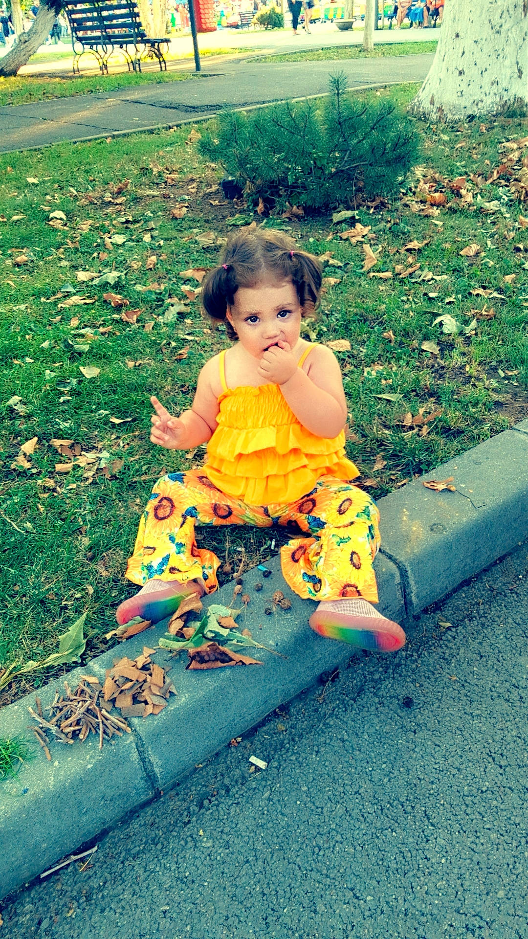 Ashleigh joined the competition — help win amazing prizes! asphalt, baby, baby_toddler_clothing, child, eye, foot, fun, grass, hair, happy, human_leg, leisure, people_in_nature, person, plant, shadow, sitting, t_shirt, tints_and_shades, toddler