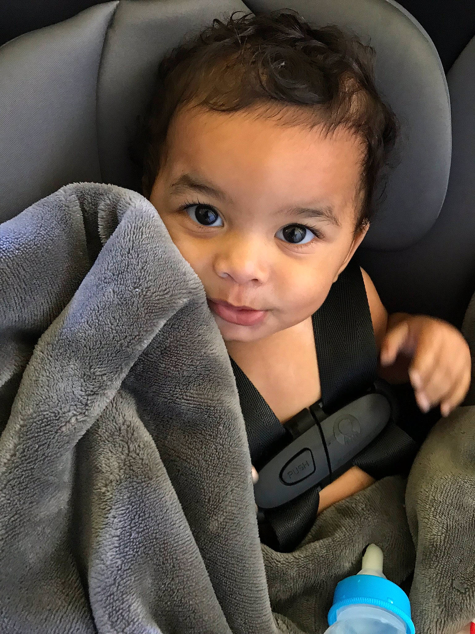 Markus is registered to the contest to win money with this photo: auto_part, baby, baby_in_car_seat, car_seat, cheek, child, ear, eye, face, head, lip, nose, person, skin, smile, toddler