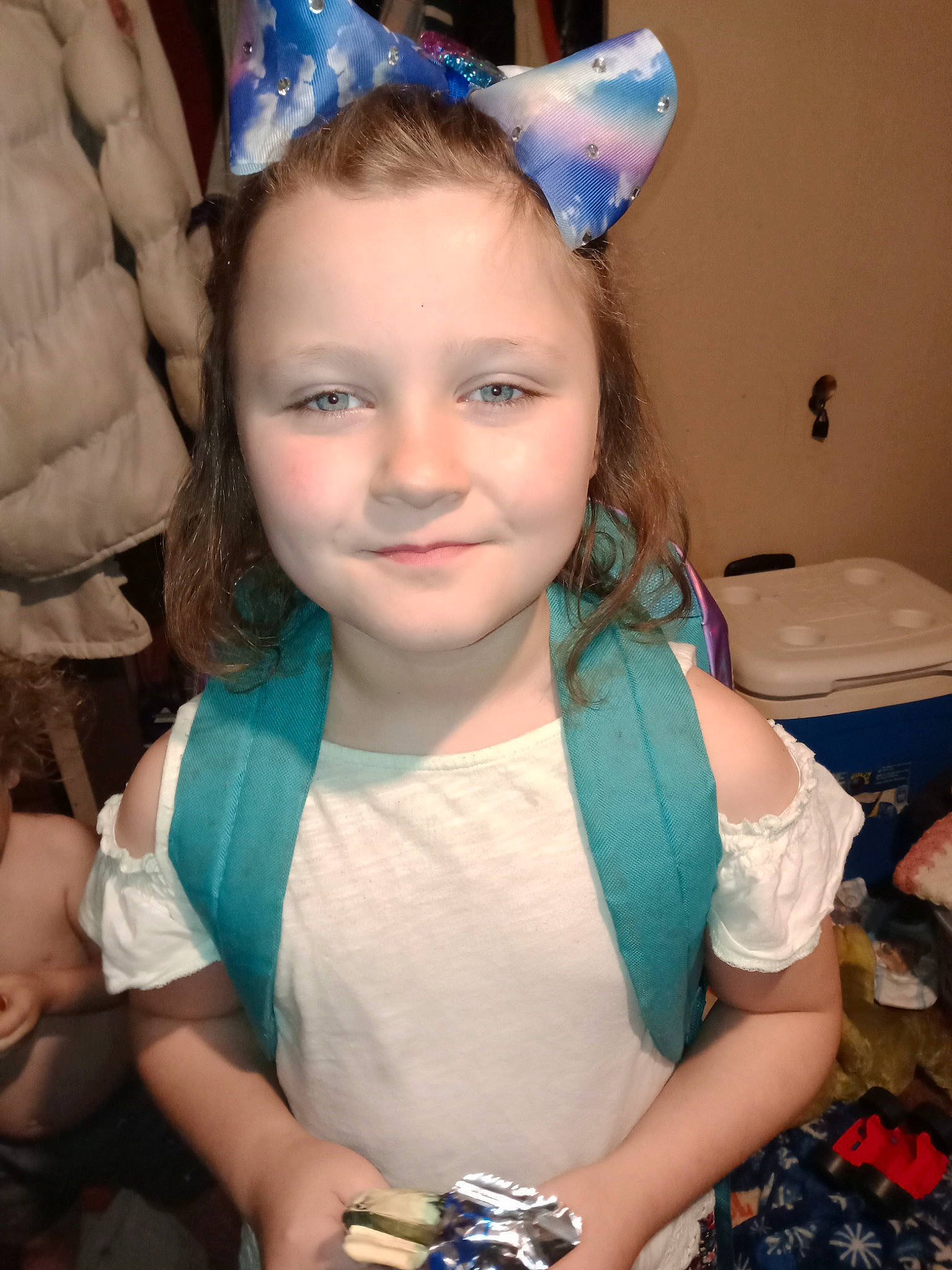 Kylie joined the competition — help win amazing prizes! beauty, blond, blue, child, costume_hat, electric_blue, event, face, facial_expression, fun, hairstyle, happy, headpiece, iris, jewellery, joy, party_hat, person, pink, smile