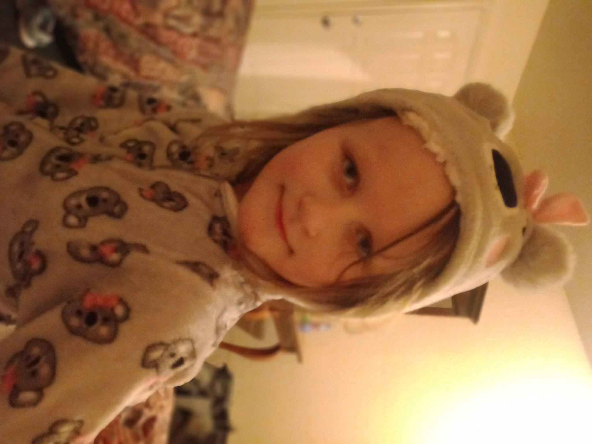 Kylie is registered to the contest to win money with this photo: baby, bed, bedding, bedtime, cheek, comfort, eyebrow, eyelash, fun, happy, headwear, human_body, joy, linens, lip, nose, person, room, sleep, sleeve