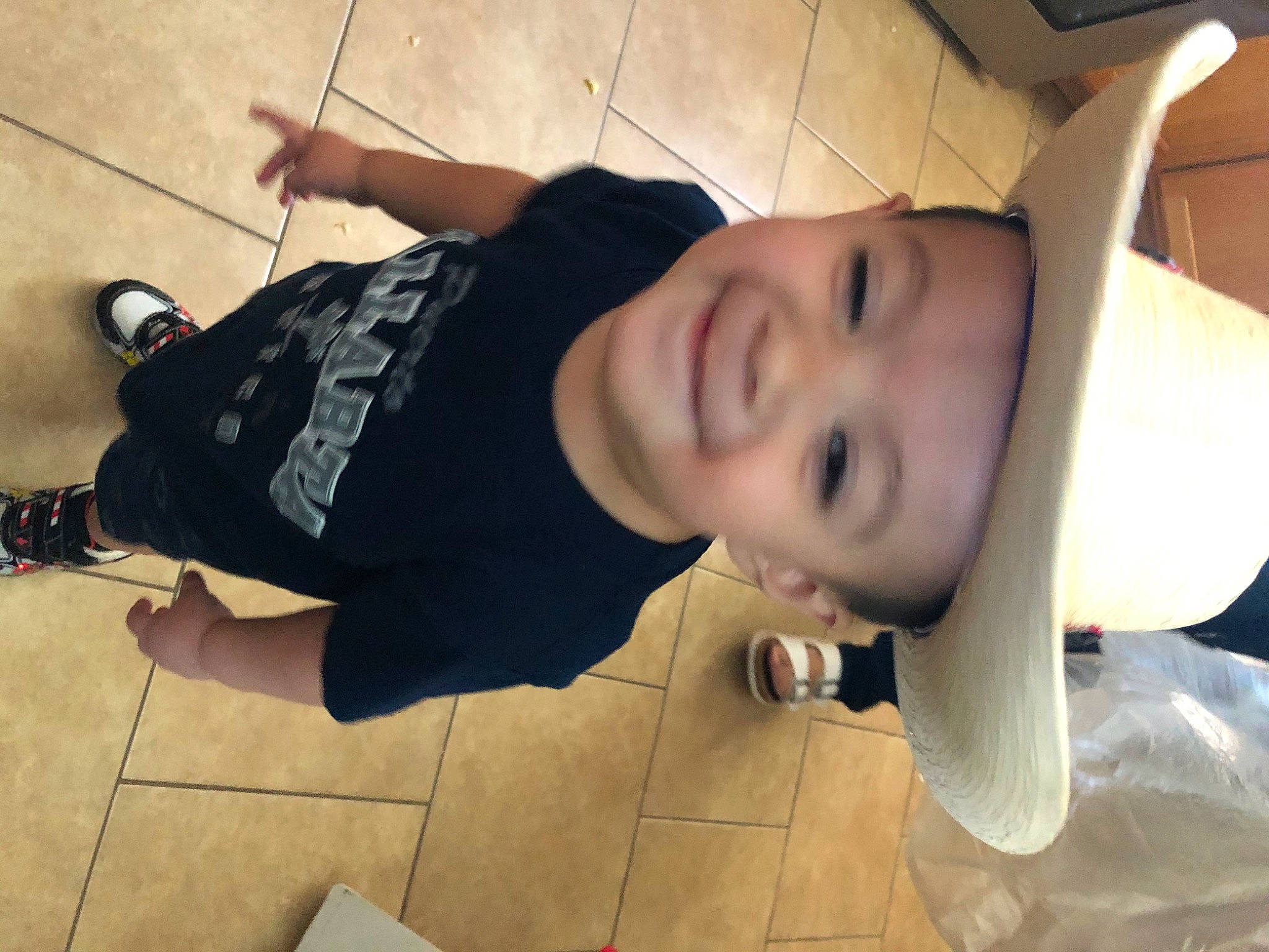 Iker is registered to the contest to win money with this photo: arm, beauty, black_hair, cool, ear, face, floor, flooring, forehead, hair, happy, head, headwear, joy, leg, mouth, neck, nose, person, photography