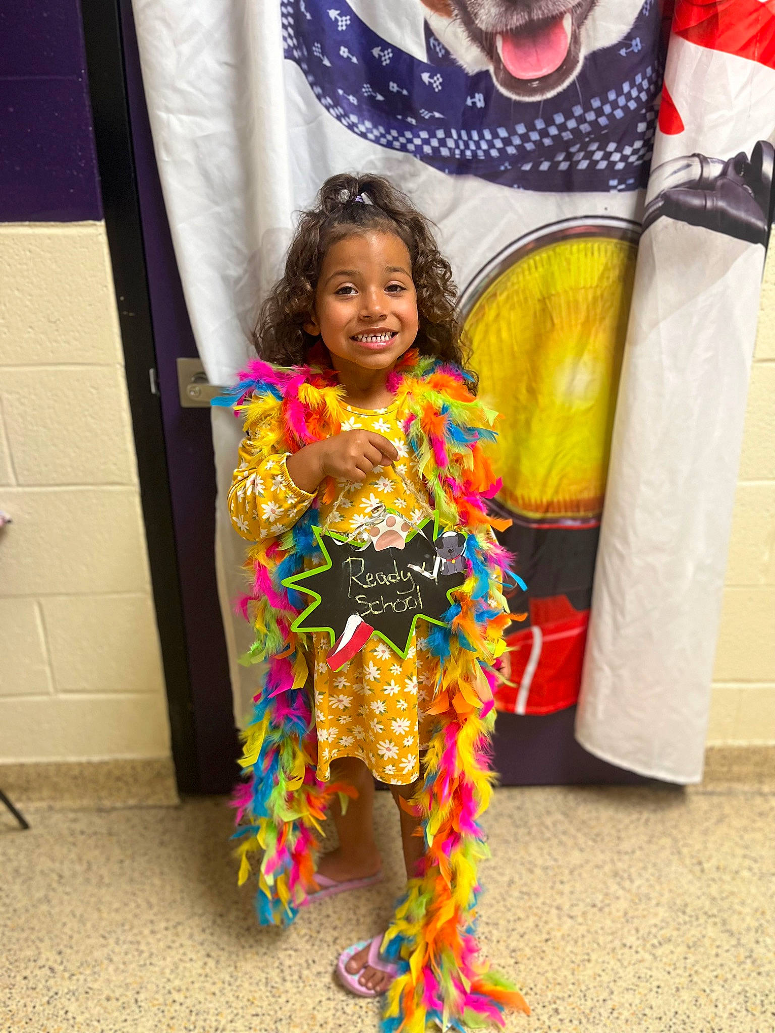 Brooklyn is registered to the contest to win money with this photo: child, costume, dress, entertainment, event, face, fashion_design, flag, flooring, fun, happy, jewellery, joy, magenta, necklace, pattern, person, room, sandal, smile