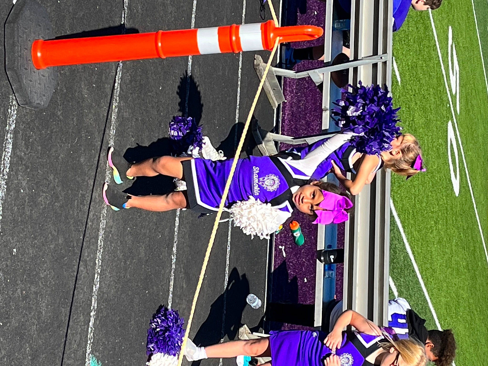 Brooklyn is registered to the contest to win money with this photo: acrobatics, basketball_hoop, cheerleading_uniform, competition, competition_event, electric_blue, entertainment, event, fun, headwear, magenta, performance, performing_arts, person, player, public_event, purple, shorts, sports, sports_uniform