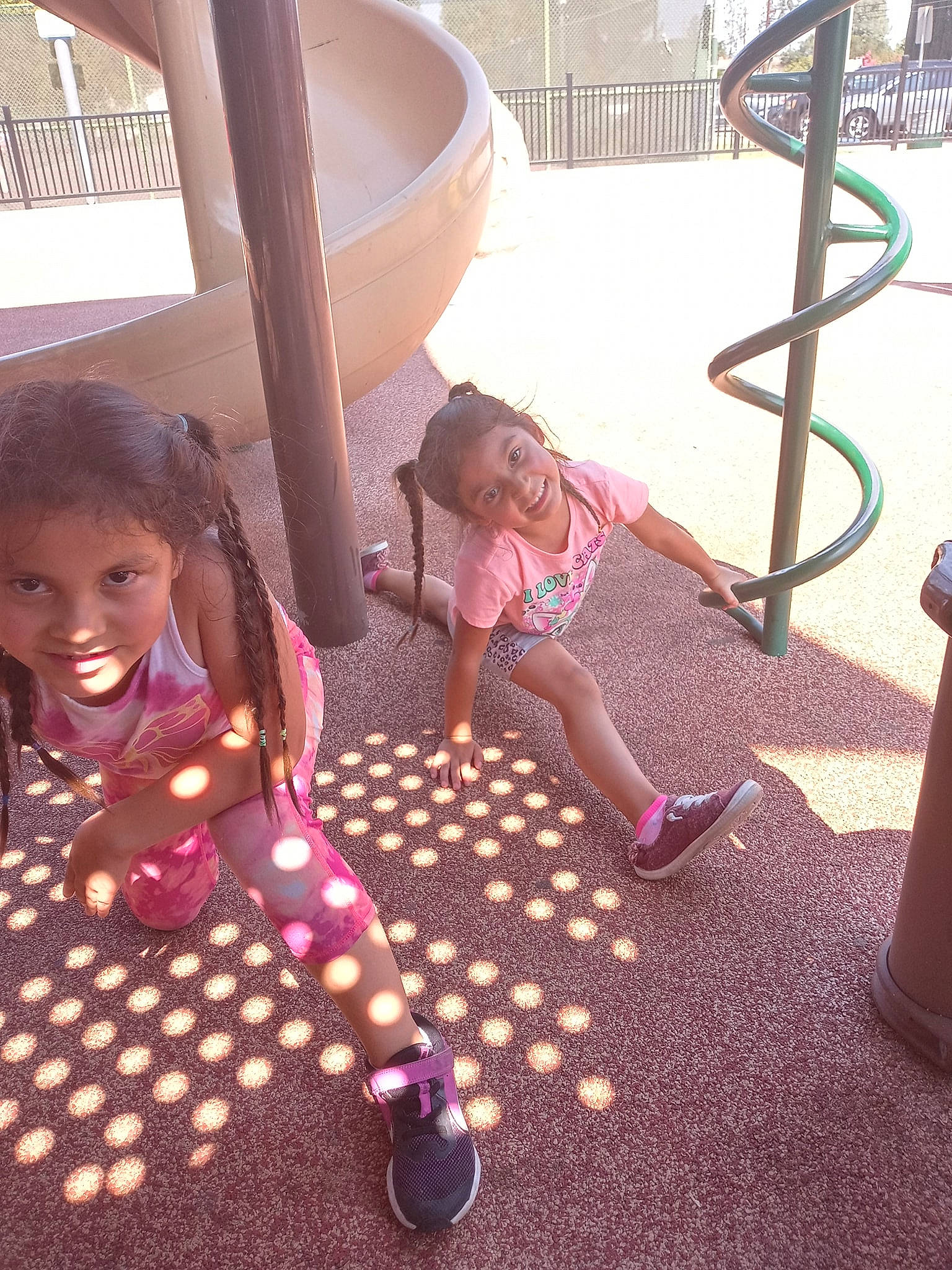 Lainee is registered to the contest to win money with this photo: child, chute, city, event, flooring, fun, happy, joy, leisure, magenta, outdoor_play_equipment, person, pink, play, playground, playground_slide, product, public_space, purple, recreation