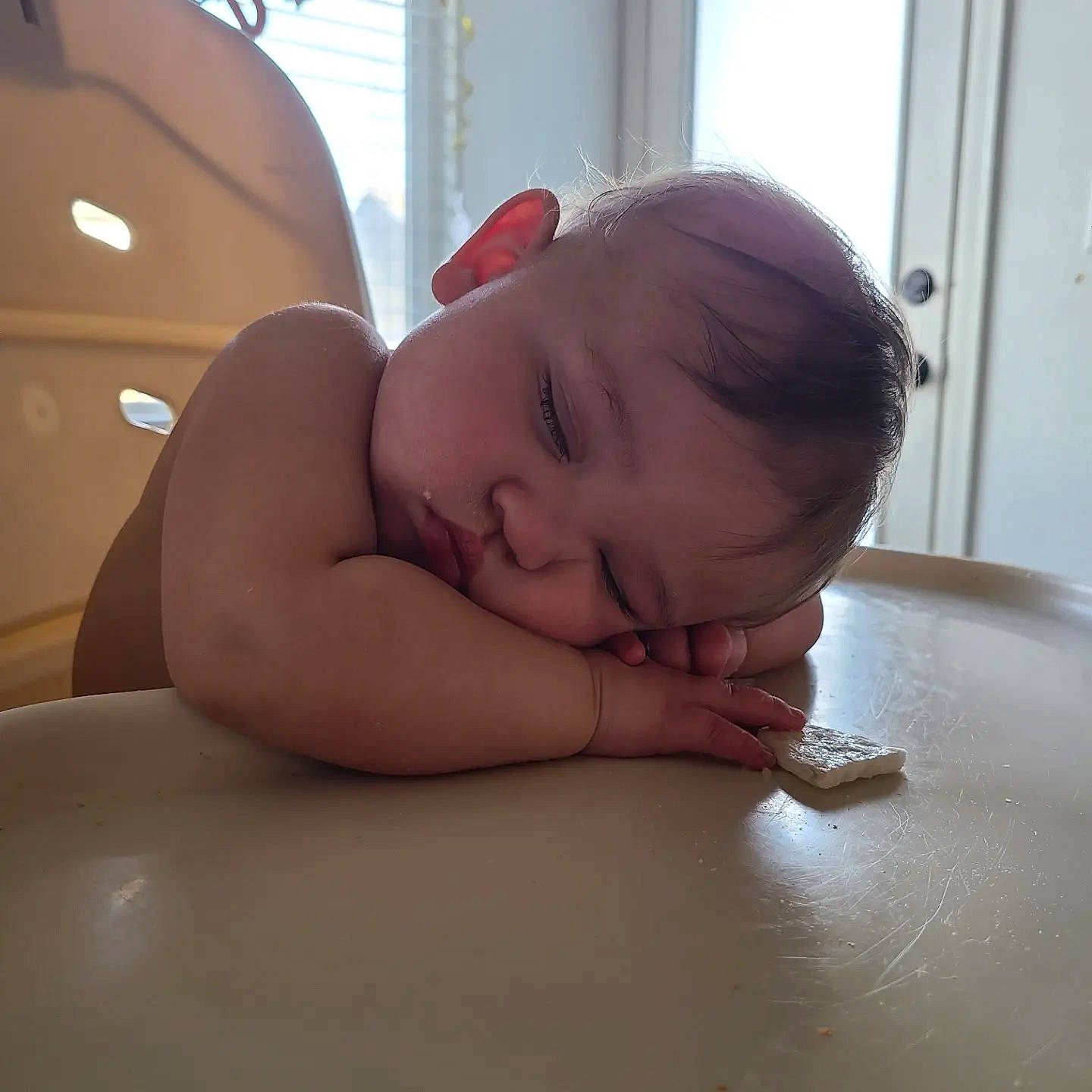 Natalie is registered to the contest to win money with this photo: baby, baby_toddler_clothing, cheek, chest, child, comfort, crawling, door, eyebrow, floor, flooring, happy, hardwood, neck, person, room, smile, table, toddler, window