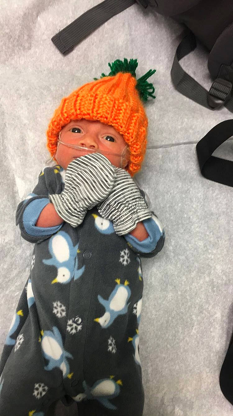 Conner is registered to the contest to win money with this photo: baby, cheek, child, headwear, person, toddler, toy