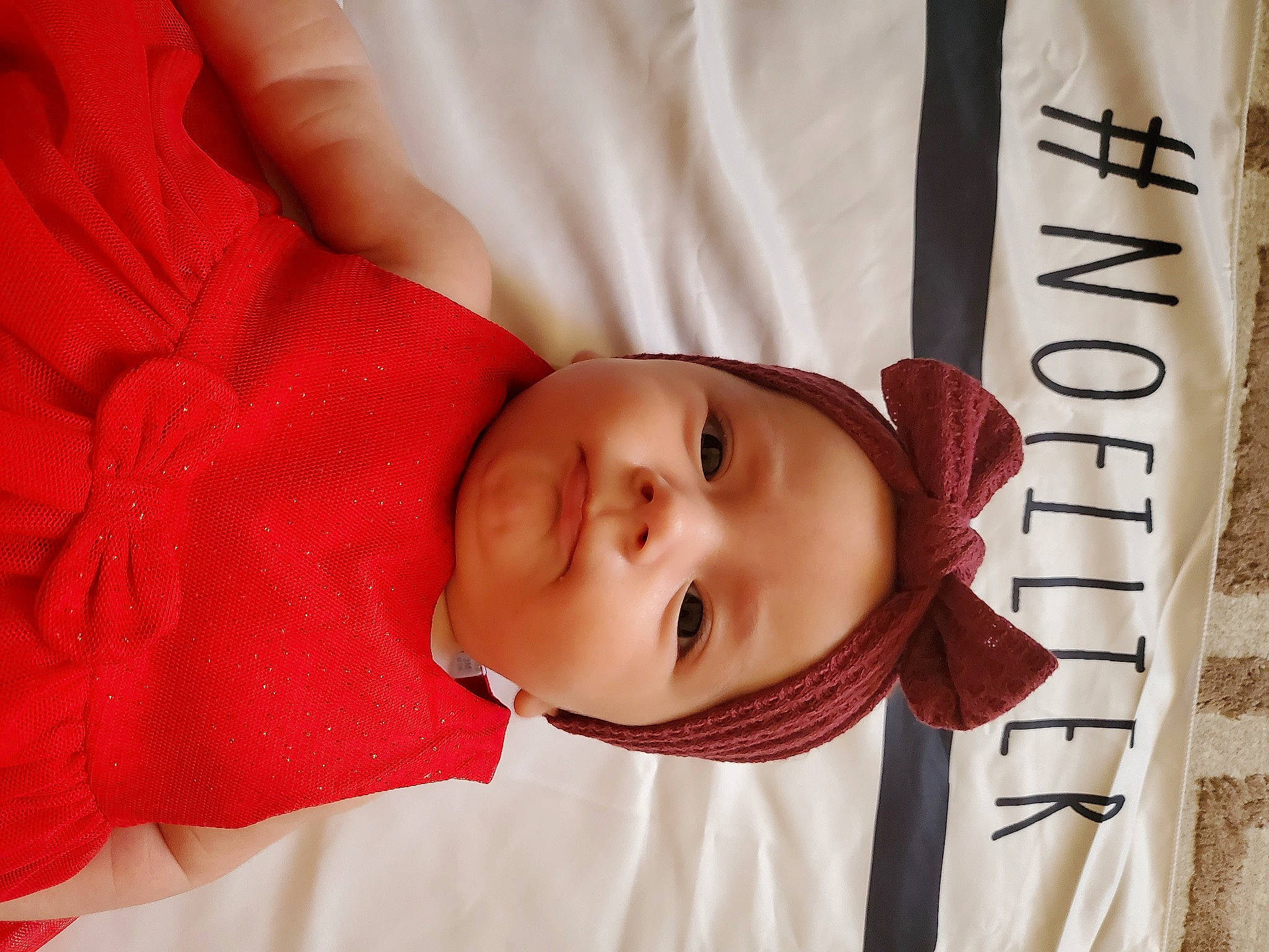 Anita participe au concours pour gagner de l'argent avec cette photo : baby, baby_products, baby_sleeping, baby_toddler_clothing, cheek, child, comfort, eyelash, happy, hat, headwear, linens, lip, nose, person, portrait_photography, room, sleeve, smile, toddler