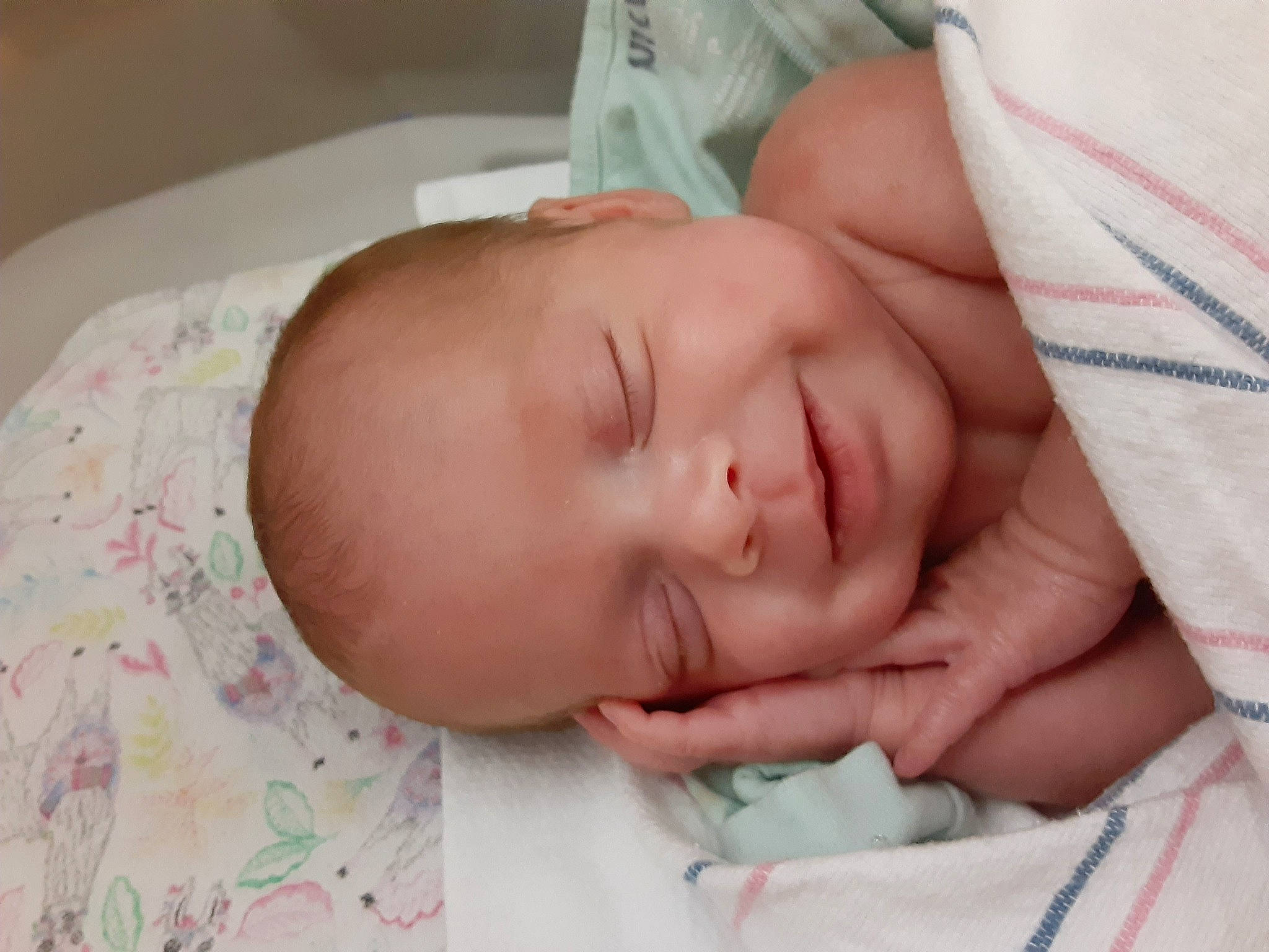 Ryver is registered to the contest to win money with this photo: baby, baby_sleeping, baby_toddler_clothing, bedtime, cheek, child, childbirth, comfort, eye, eyebrow, finger, human_body, iris, linens, nap, nose, person, room, skin, sleep