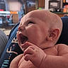 Richard is registered to the contest to win money with this photo: baby, candid, ear, expression, face, furniture, hand, happy, human, indoor, infant, joy, kitchen, mouth, newborn, person, portrait, skin, skin_texture, smiling