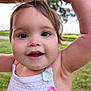 arms_up, baby, child, close_up, cute, daylight, dress, eyes, face, greenery, happy, knitted, nature, outdoor, person, portrait, skin, smiling, summer, toddler