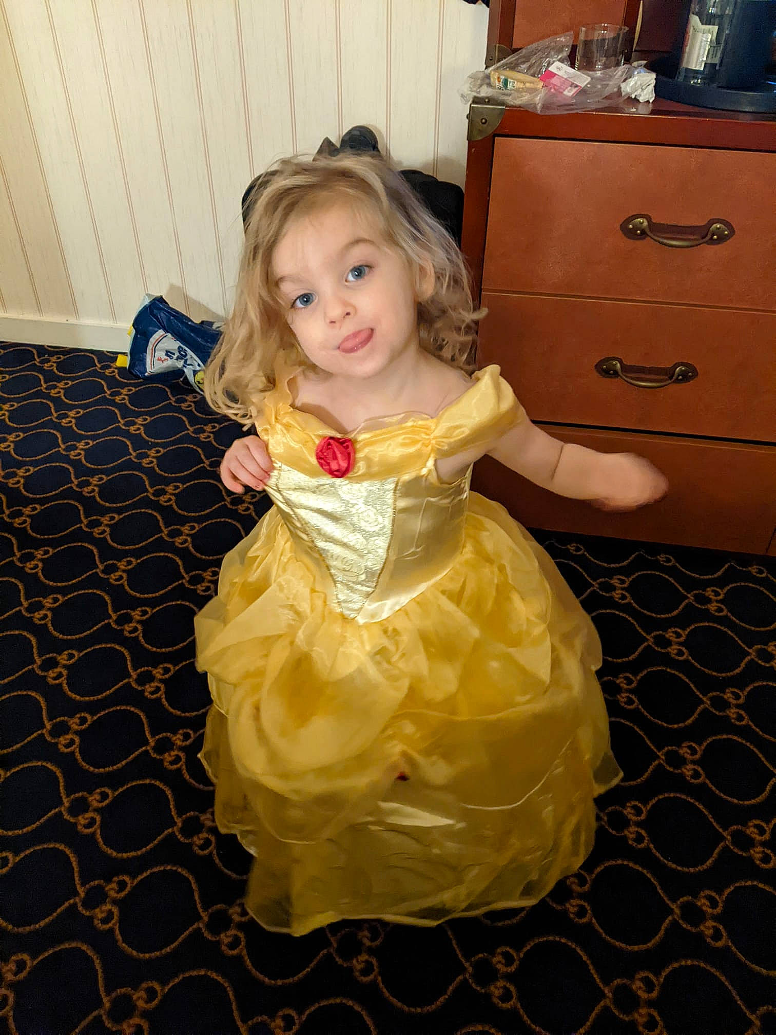 Elvina a rejoint le concours — aidez-le/la à gagner de superbes lots ! baby_toddler_clothing, cabinetry, chest, chest_of_drawers, drawer, dress, dresser, event, floor, flooring, formal_wear, fun, hair, happy, hardwood, head, human_body, person, smile, toddler