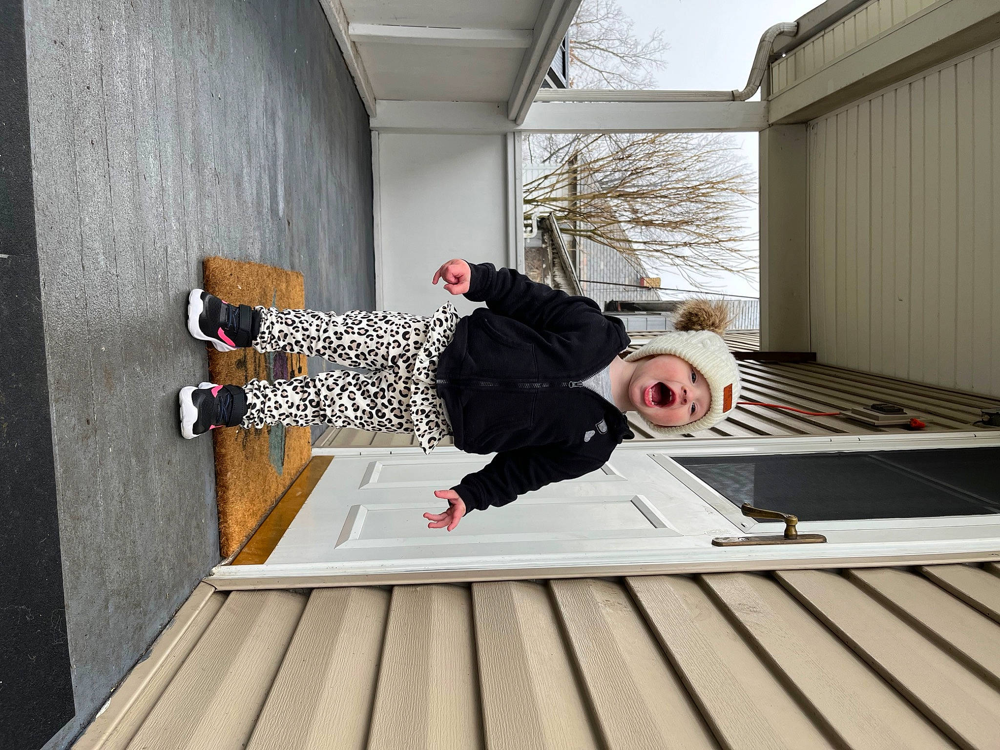 Anastasia is registered to the contest to win money with this photo: comfort, composite_material, daylighting, door, flooring, hardwood, headwear, house, leisure, person, plant, room, sitting, sleeve, t_shirt, thigh, tree, waist, walking_shoe, wood