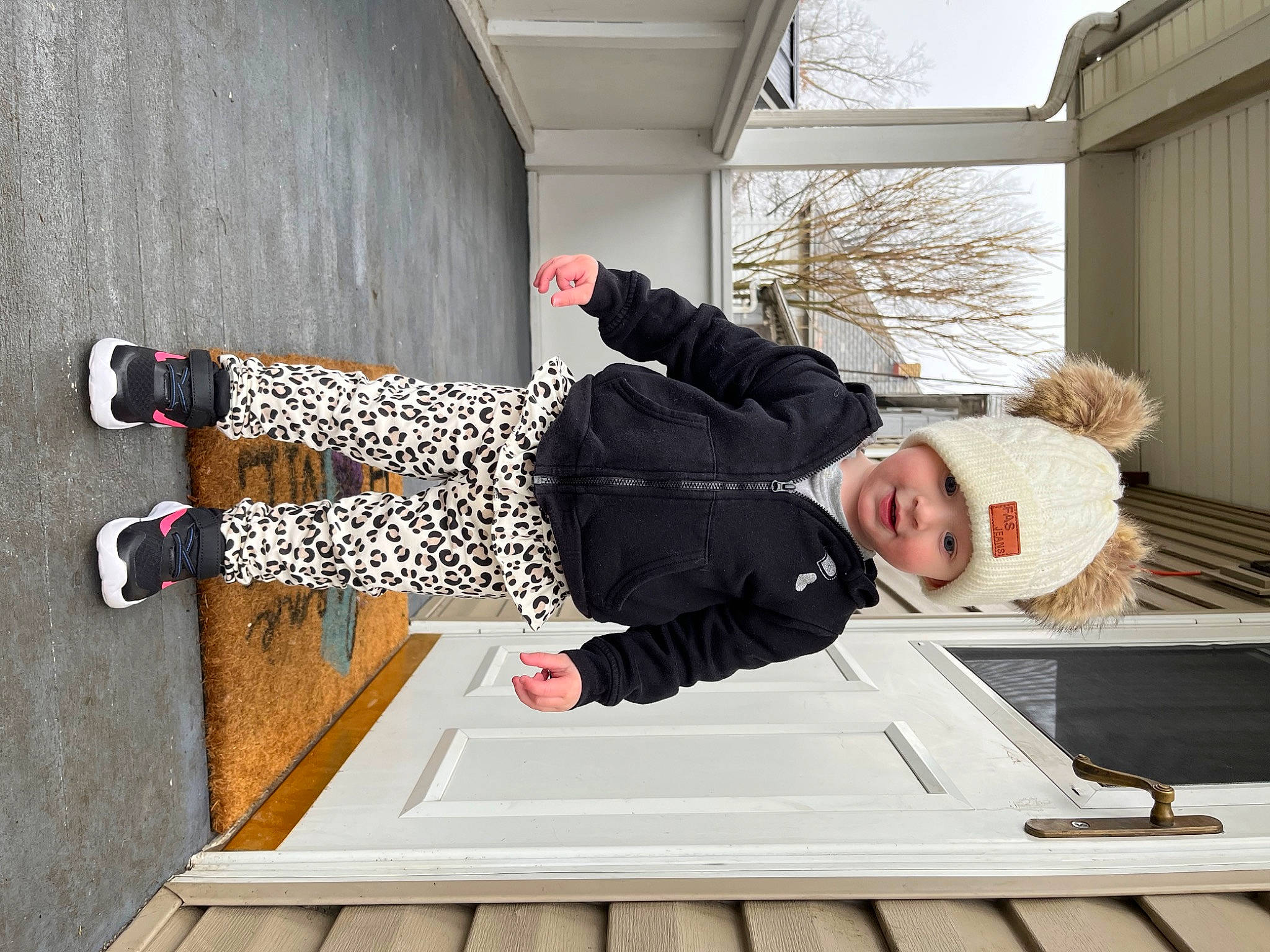 Anastasia joined the competition — help win amazing prizes! comfort, fun, headwear, human_leg, jacket, knee, leisure, outdoor_shoe, person, recreation, sitting, sleeve, toddler, tree, walking_shoe, wood