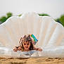 Everleigh joined the competition — help win amazing prizes! beach, child, float, fun, girl, greenery, hair_accessories, inflatable, lake, nature, outdoor, playful, portrait, relaxation, sand, shell, smiling, summer, vacation, water