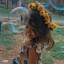 Everleigh is registered to the contest to win money with this photo: bubbles, child, cute, face, flower_crown, fun, garden, girl, grass, happy, nature, outdoor, playful, portrait, smile, summer, sunflower_dress, sunlight, trees, young