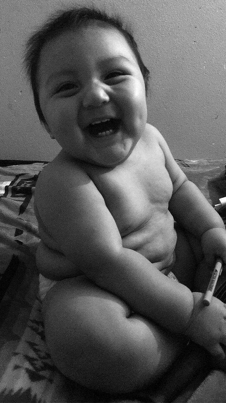 Tavion is registered to the contest to win money with this photo: arm, black, cheek, chin, eye, eyebrow, eyelash, face, facial_expression, hand, human_body, lip, mouth, muscle, nose, organ, person, photograph, skin, smile