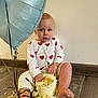 baby, cake, birthday, messy, balloon, pajamas, floor, foot, hand, face, cream, crumbs, celebration, child, indoor, wall, wooden_floor, cute, happy, smudged