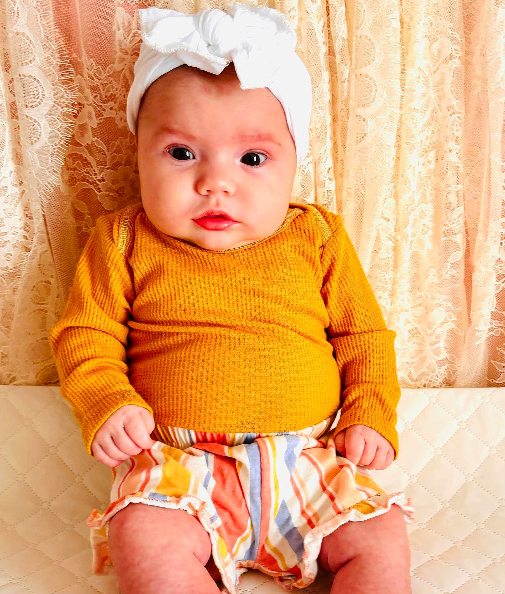 Joy joined the competition — help win amazing prizes! baby, bodypart, bonnet, cap, clothing, couch, face, finger, furniture, hand, hat, head, knitwear, person, photography, portrait, shorts, sitting, sleeve, sweater