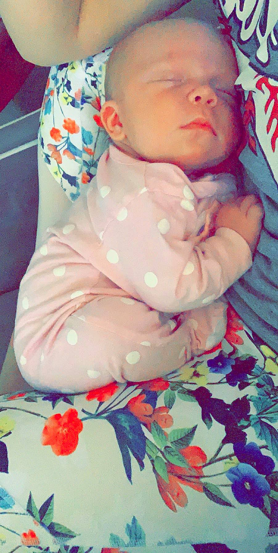 Regan is registered to the contest to win money with this photo: baby, baby_toddler_clothing, cheek, child, lip, pattern, person, pink, skin, smile, textile, toddler