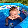 Braxton joined the competition — help win amazing prizes! baby, child, pool, water, inflatable_pool, rubber_duck, outdoor, grass, sunlight, summer, play, cute, splash, toy, fun, blue, skin, young_child, vacation, happy