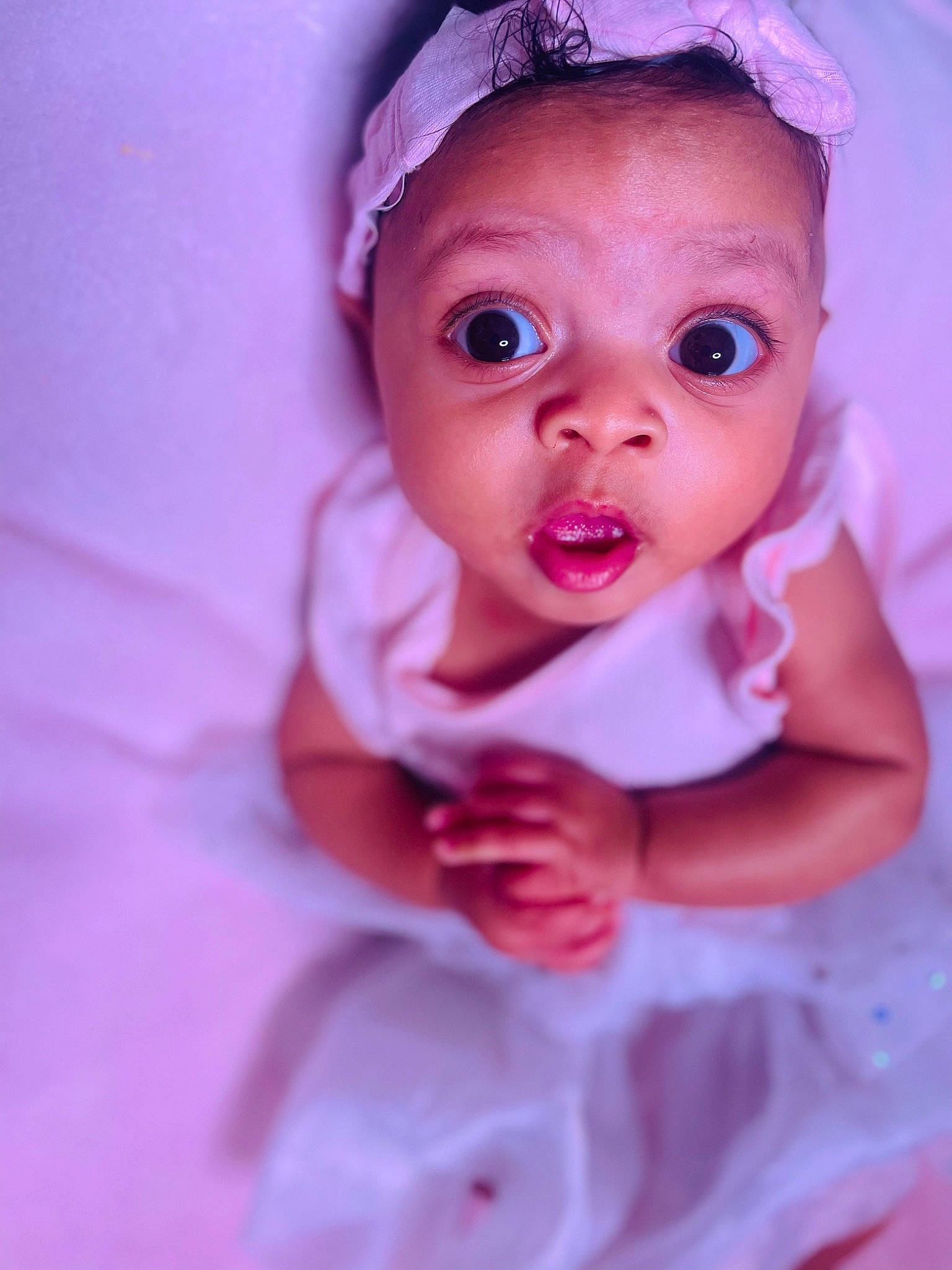 Oaklynn joined the competition — help win amazing prizes! baby, baby_toddler_clothing, cheek, dress, eye, eyebrow, eyelash, finger, happy, head, headgear, human_body, iris, lip, person, pink, purple, skin, sleeve, surprise