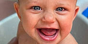 Amari joined the competition — help win amazing prizes! baby, bare_chest, blue_eyes, child, closeup, cute, expression, happy, indoors, infant, joyful, mouth_open, playful, portrait, skin, smiling, tongue, tub, water, wet_hair