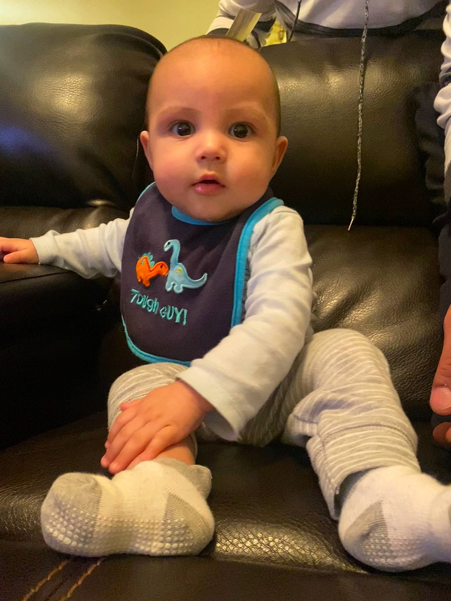 Damian joined the competition — help win amazing prizes! baby, baby_toddler_clothing, car_seat, cheek, child, comfort, cool, eye, finger, flooring, fun, happy, human_leg, knee, outerwear, person, sitting, skin, sleeve, smile