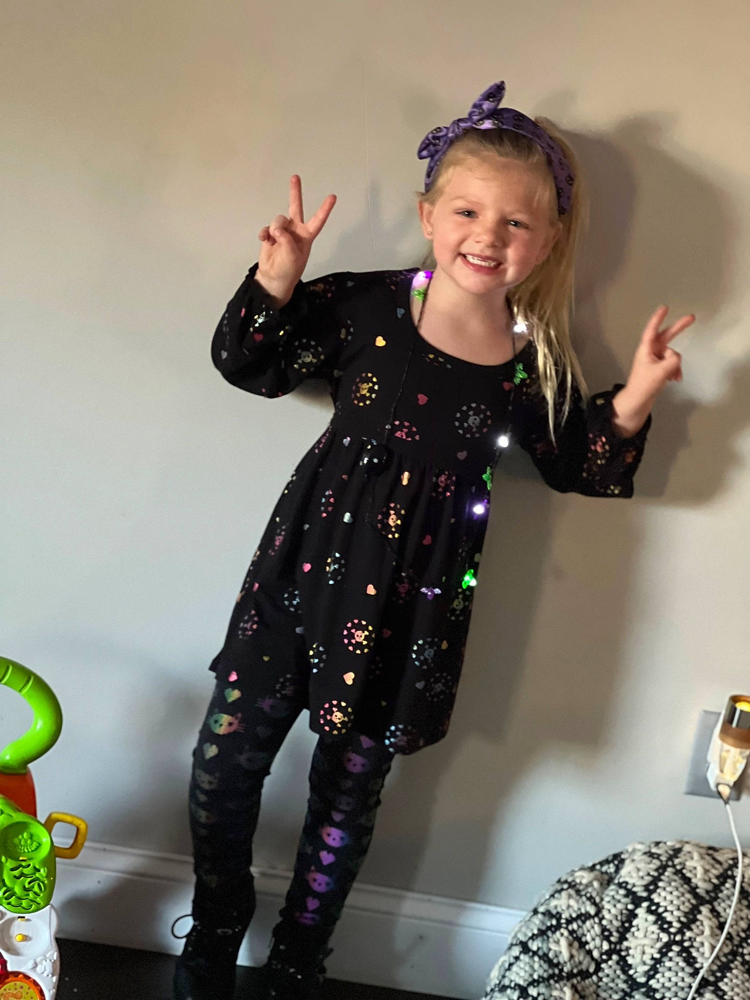 Makenlie is registered to the contest to win money with this photo: event, fashion_accessory, fashion_design, flooring, formal_wear, fun, gesture, hairstyle, happy, human_leg, joy, knee, latex, leggings, pattern, person, sleeve, smile, sportswear, standing