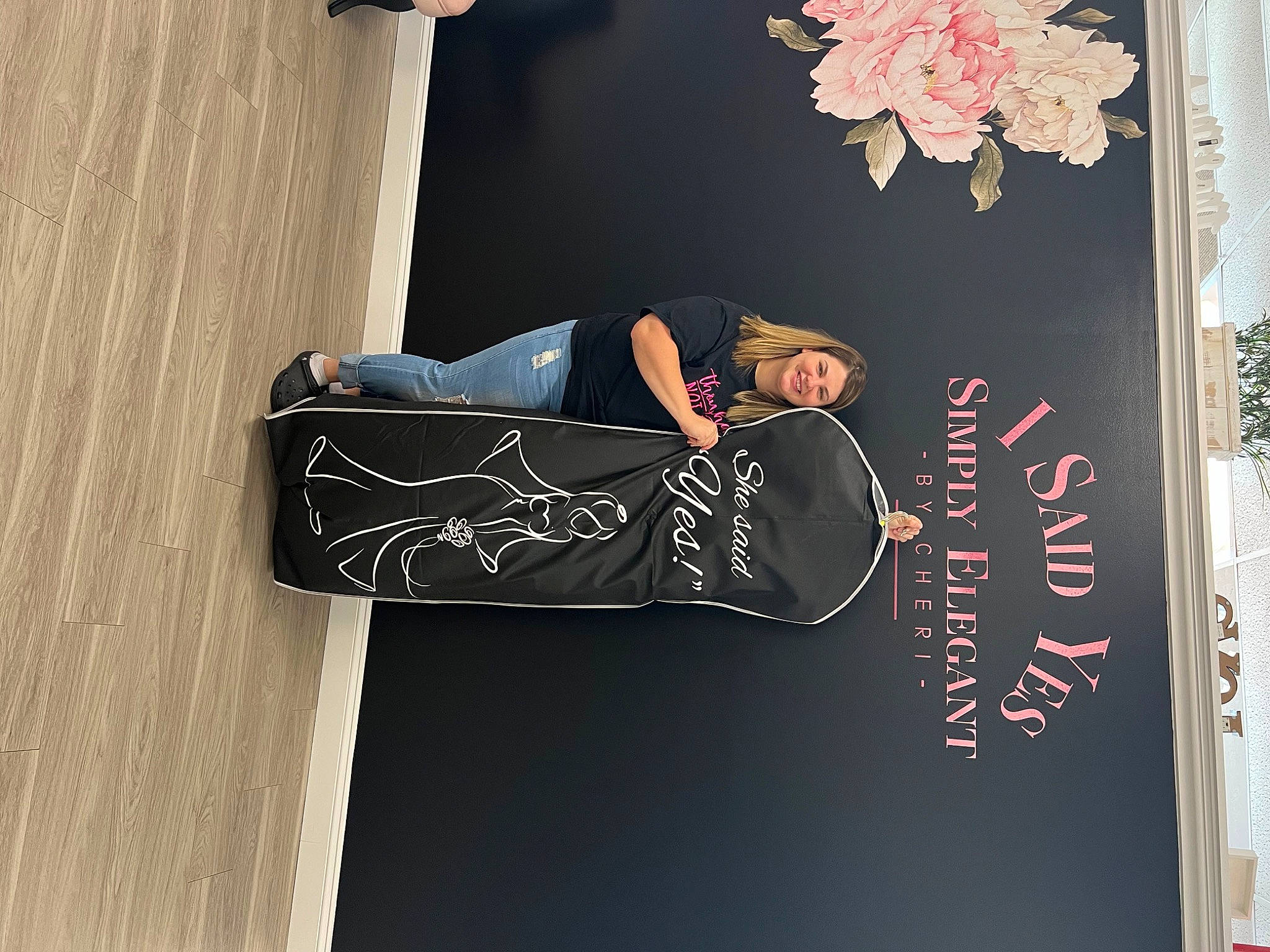 Makenlie is registered to the contest to win money with this photo: advertising, art, carmine, dress, flower, font, graphic_design, graphics, hardwood, illustration, joy, person, petal, room, sleeve, visual_arts, wood, wrist