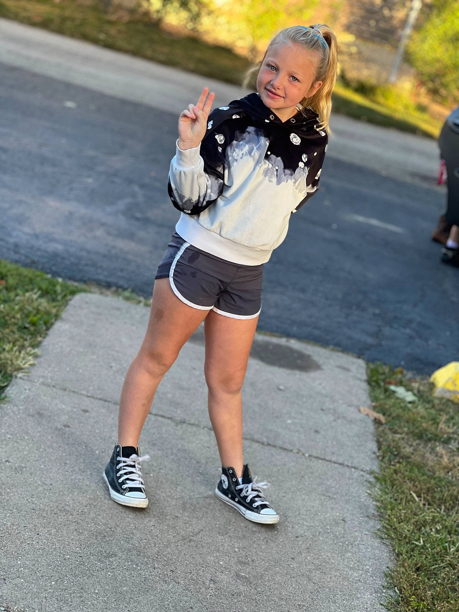 Macie joined the competition — help win amazing prizes! asphalt, calf, denim, electric_blue, eyewear, grass, human_leg, joy, knee, leisure, pedestrian, person, plant, recreation, road, shorts, sportswear, street, t_shirt, thigh