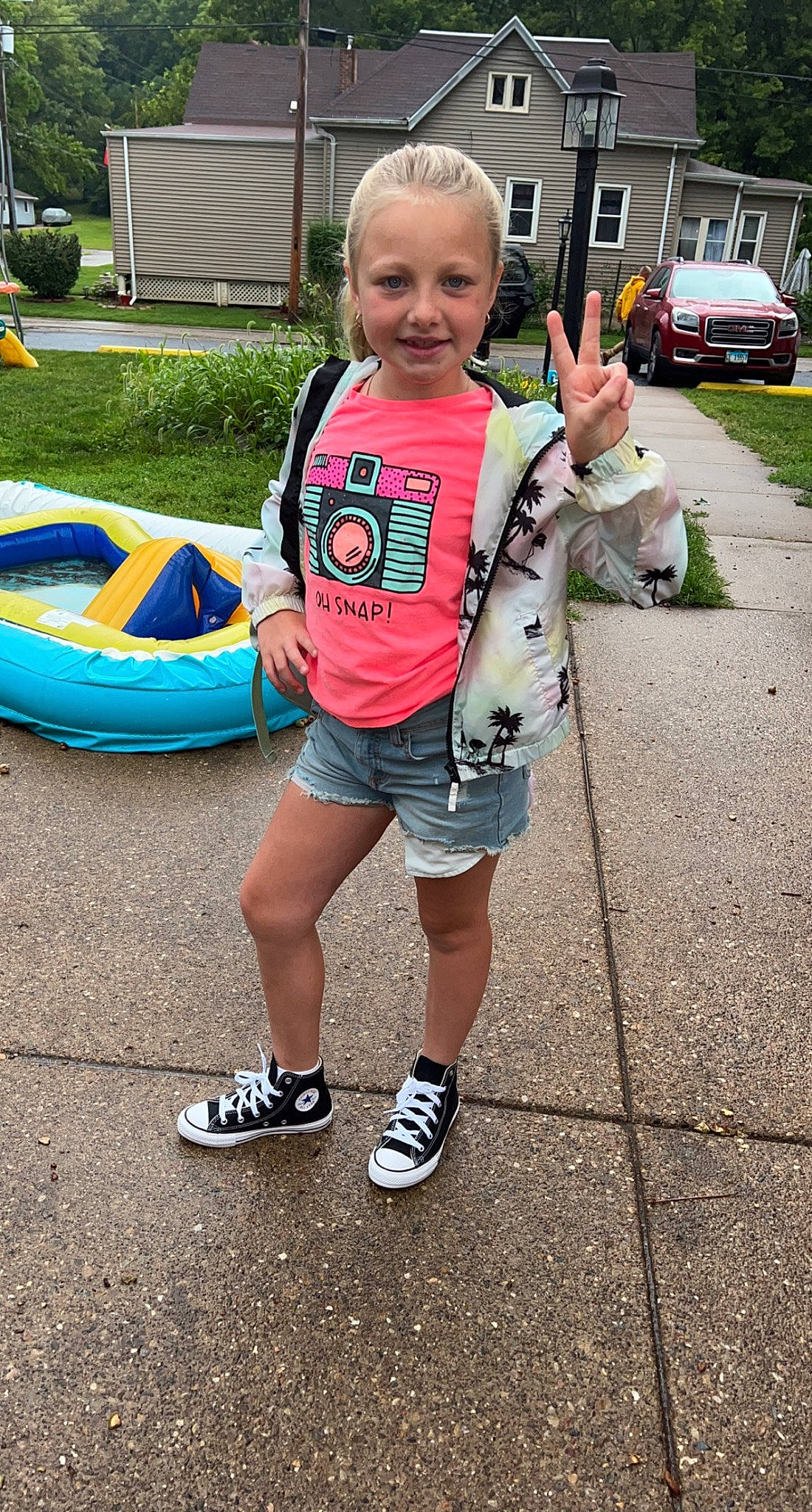 Macie joined the competition — help win amazing prizes! asphalt, boats_and_boating_equipment_and_supplies, car, child, electric_blue, fun, grass, human_leg, joy, leisure, pedestrian, person, plant, recreation, road, shorts, smile, summer, t_shirt, thigh