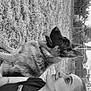 woman, dog, german_shepherd, outdoor, grass, pet, animal, companion, nature, portrait, black_and_white, relaxing, side_view, casual_clothing, fence, trees, daytime, friendship, animal_portrait, smile