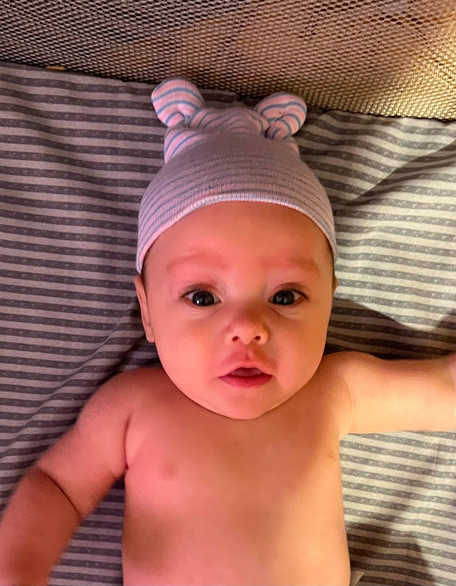 Willie is registered to the contest to win money with this photo: baby, baby_toddler_clothing, cap, cheek, chest, chin, ear, eyebrow, eyelash, fashion_accessory, forehead, happy, headgear, headpiece, headwear, lip, mouth, neck, nose, person