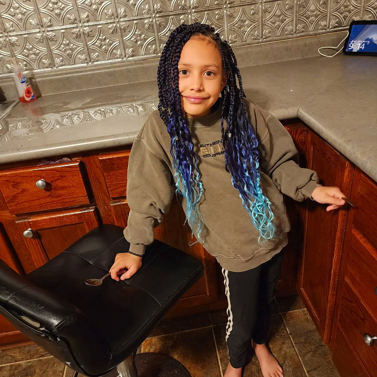 Dawson is registered to the contest to win money with this photo: bag, blazer, brown_hair, chair, eyewear, fashion_accessory, fashion_design, formal_wear, human_leg, jewellery, joint, joy, knee, leggings, luggage_and_bags, neck, outerwear, person, scarf, sleeve