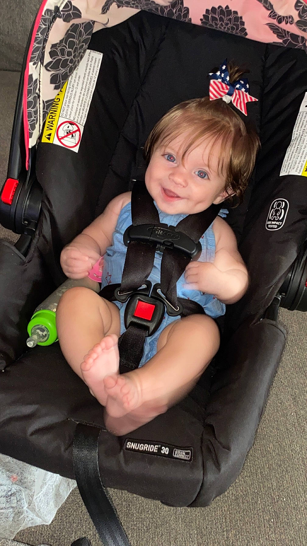 Novah joined the competition — help win amazing prizes! arm, auto_part, baby_carriage, baby_products, baby_toddler_clothing, bag, car_seat, comfort, finger, hand, joy, knee, lap, leg, luggage_and_bags, person, product, sitting, smile, thigh