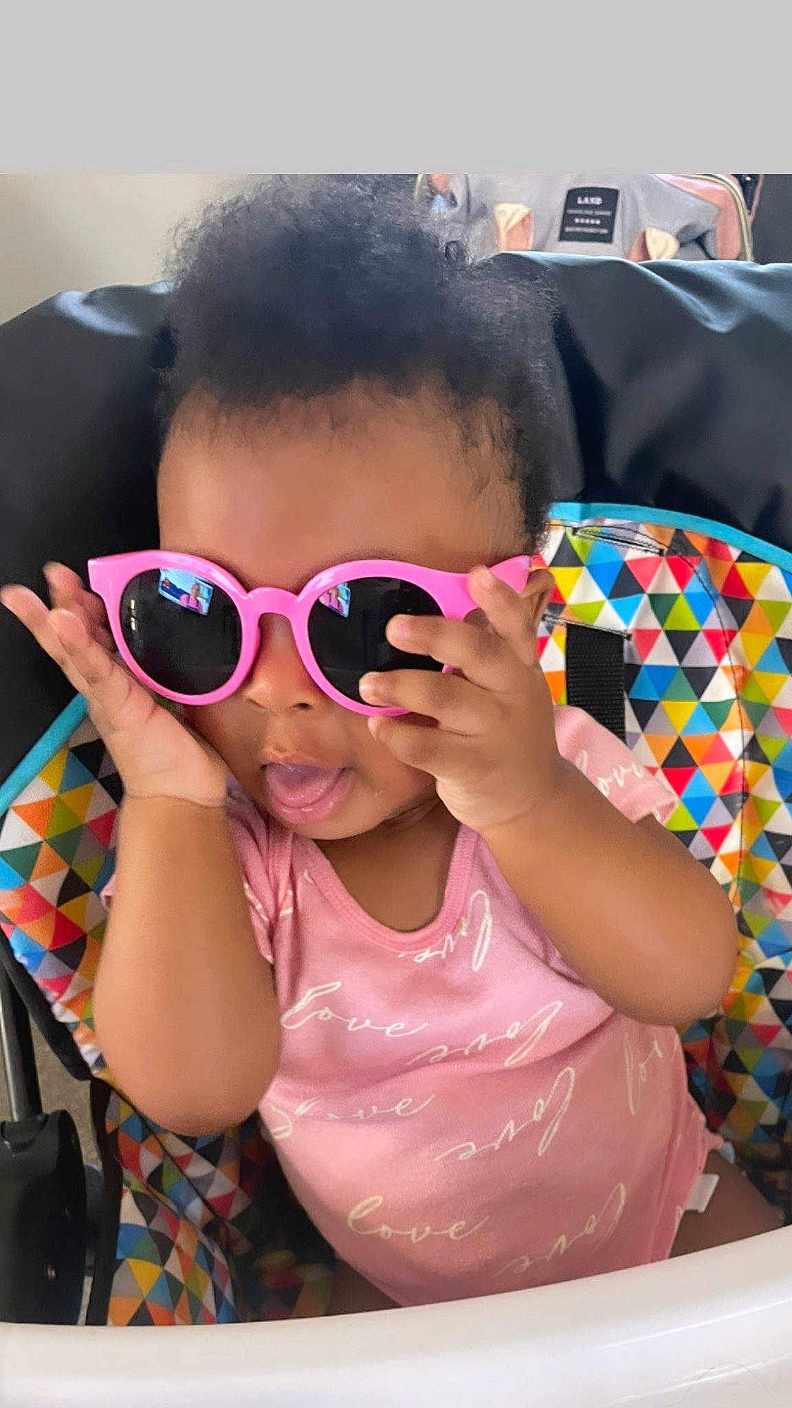 Genesis is registered to the contest to win money with this photo: baby_toddler_clothing, event, eye_glass_accessory, eyewear, fashion_accessory, fun, glasses, goggles, happy, leisure, lip, magenta, mouth, person, personal_protective_equipment, pink, recreation, skin, sunglasses, toddler